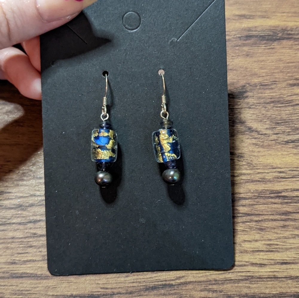 2/20$ 925 Silver dangle earrings